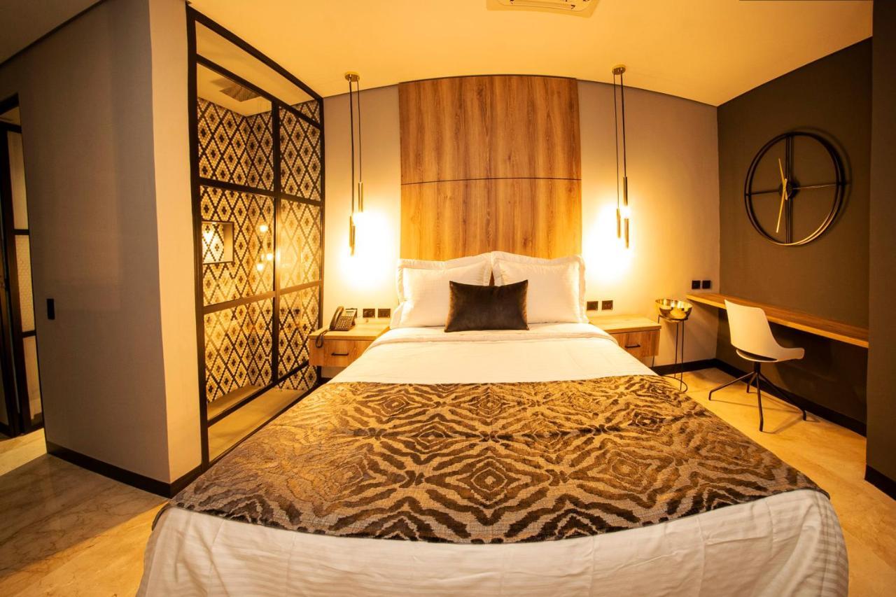 Cavalta By Bernalo Hotels Medellín Kültér fotó A bedroom at the hotel