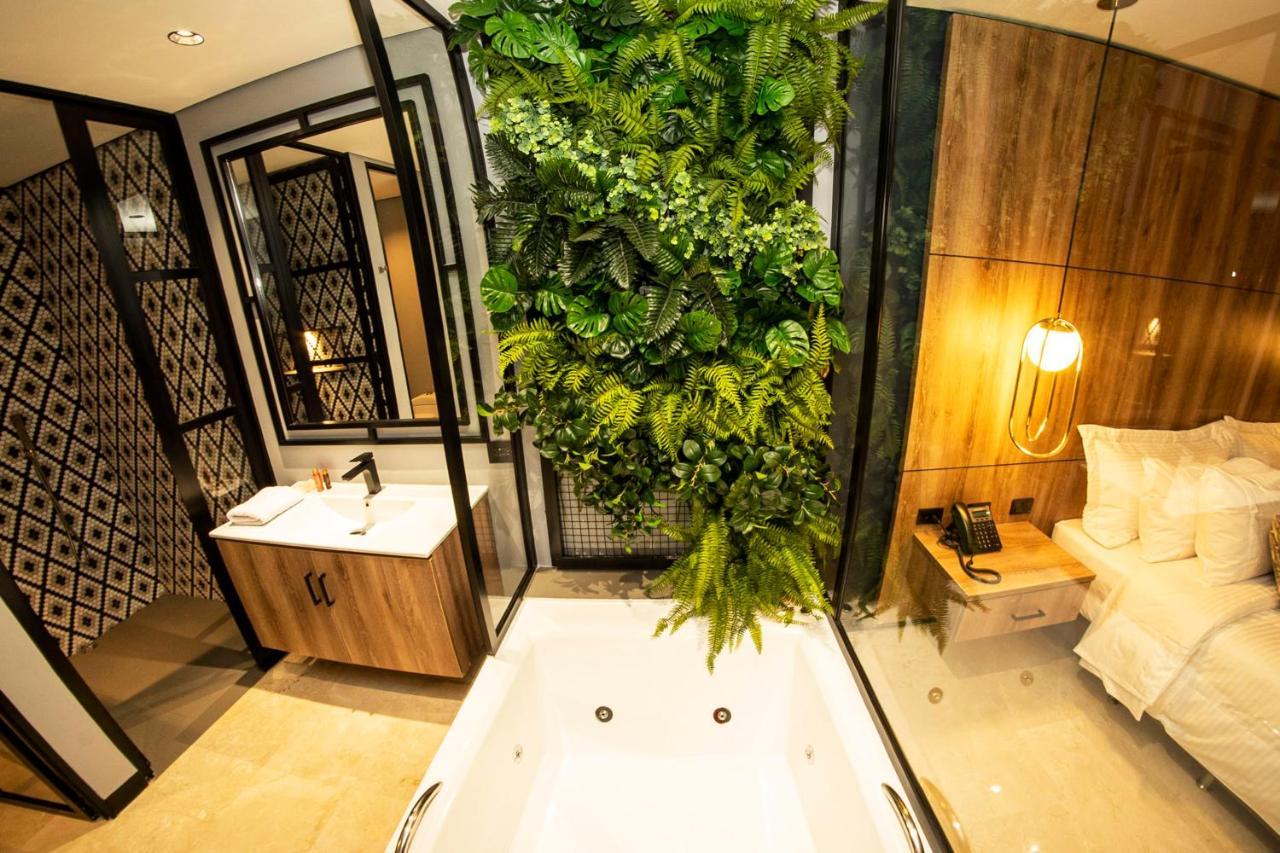 Cavalta By Bernalo Hotels Medellín Kültér fotó A bathroom in a hotel