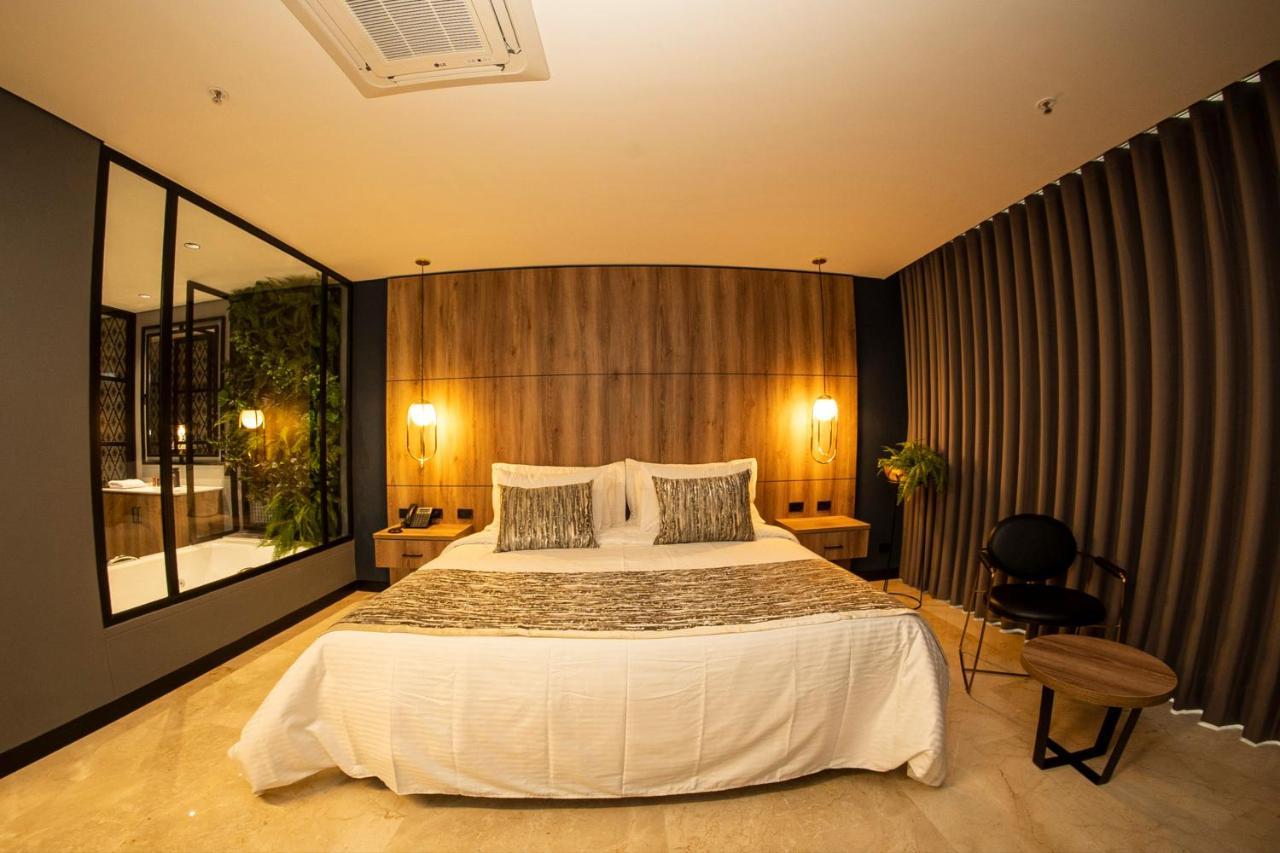 Cavalta By Bernalo Hotels Medellín Kültér fotó A bedroom at the hotel